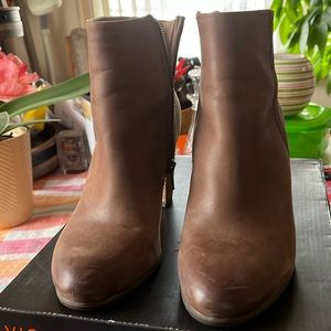 Brown taupe leather booties w/ about 4” heels.